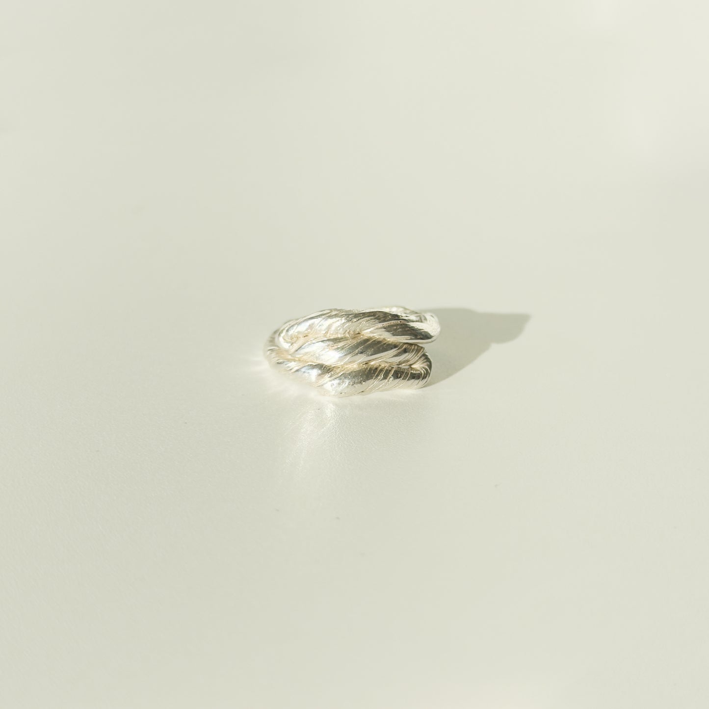 Front view of the Anchor silver ring, pictured on a light plain background.