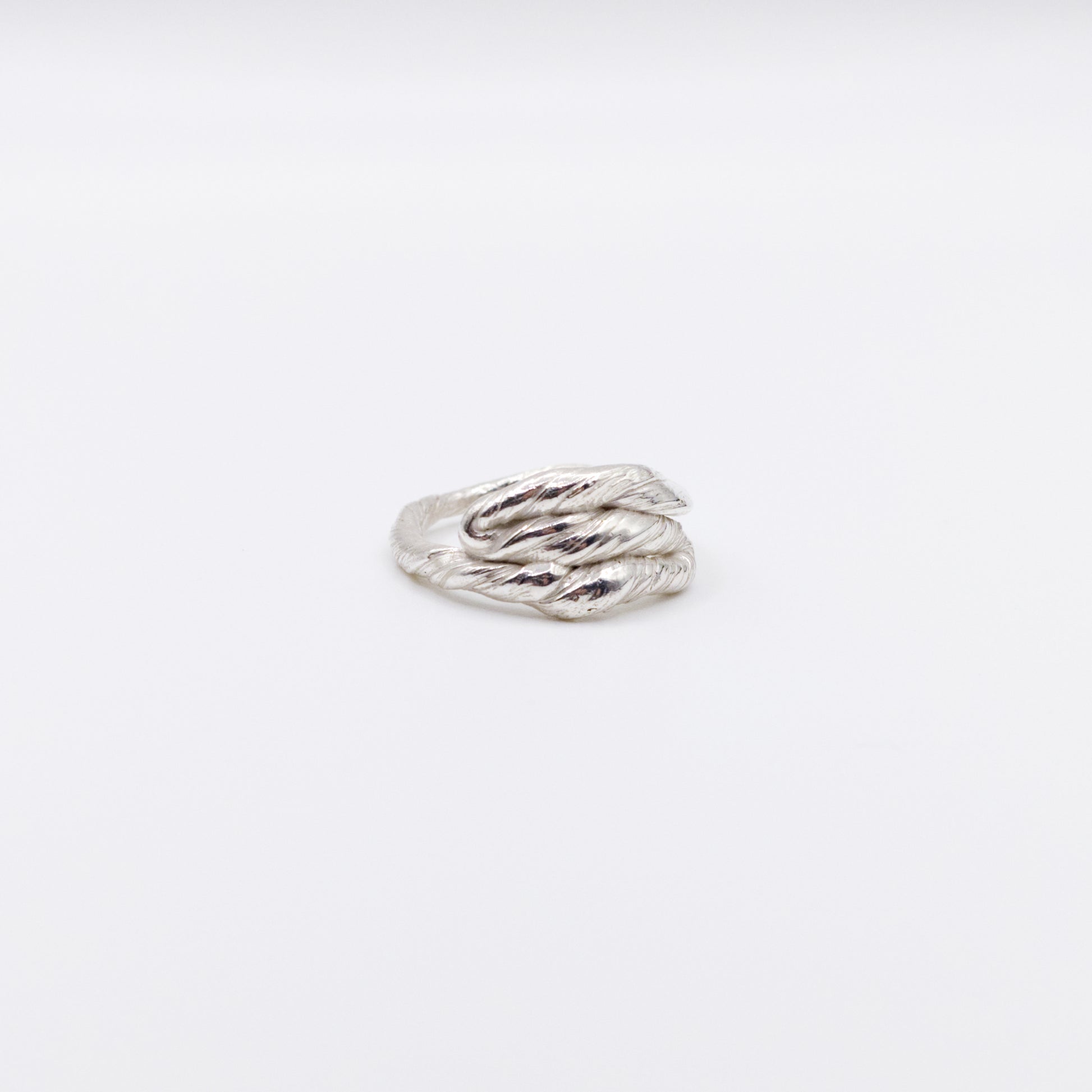 Front view of the Anchor silver ring, pictured on a light plain background.