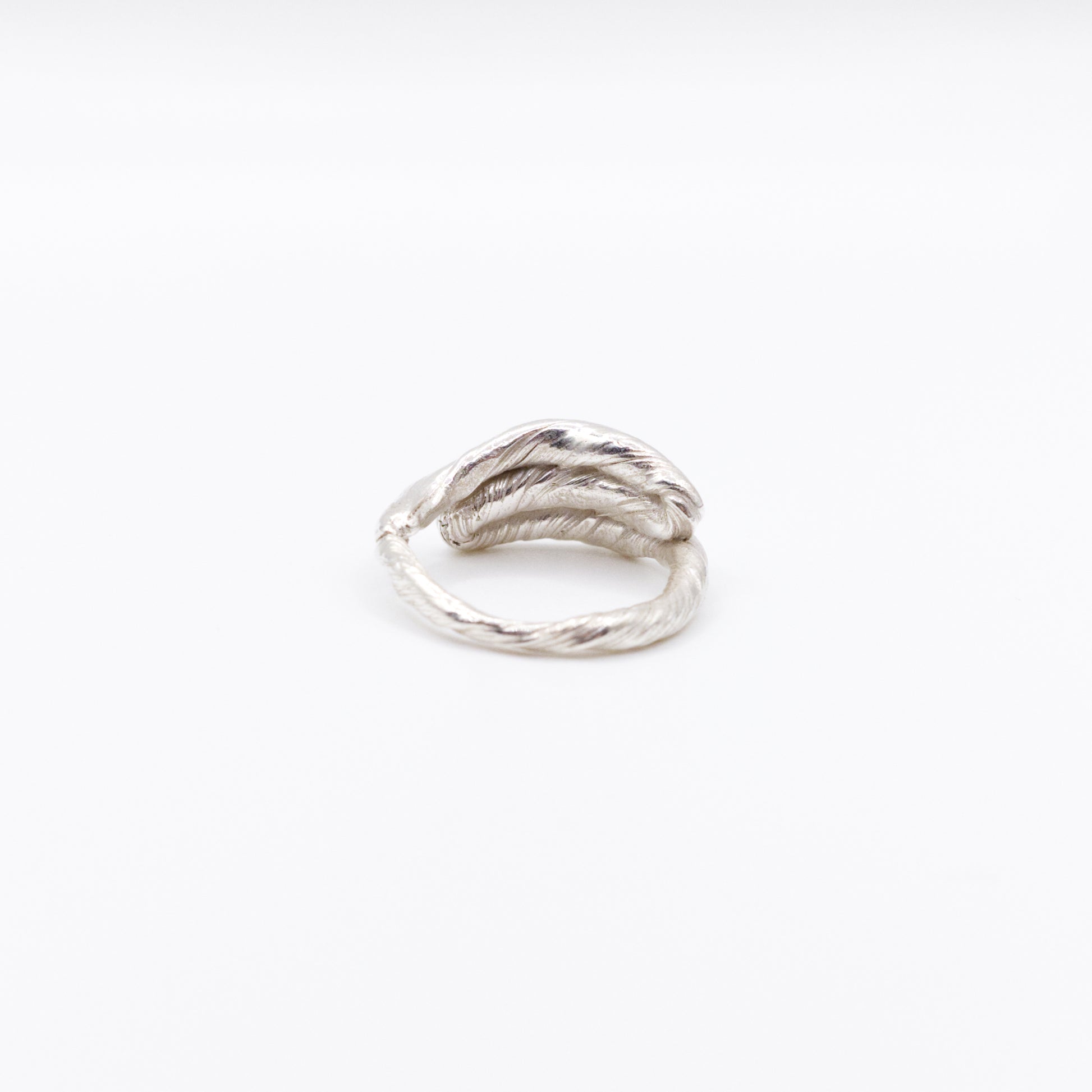 Back view of the Anchor silver ring, pictured on a light plain background.