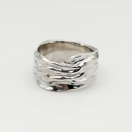 Front view of the Canyon sample silver ring, pictured on a light plain background.